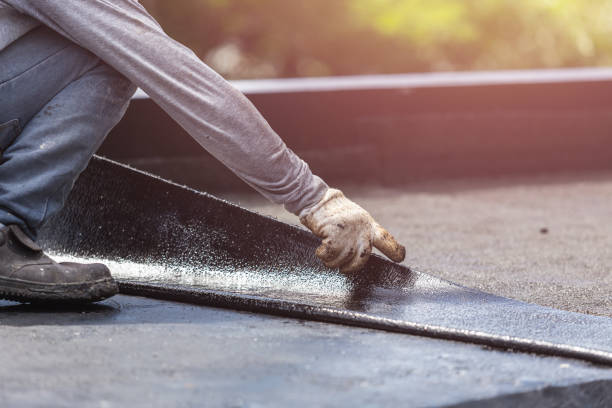 Professional Basement Waterproofing technician working in Oswego, IL